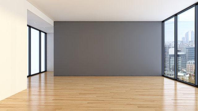Empty modern apartment with a charcoal accent wall, full-height windows, and a city skyline view
